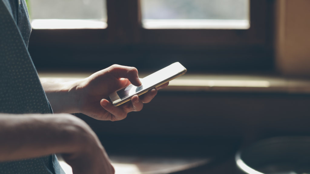 Person using a mobile app